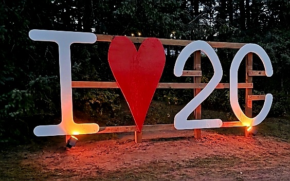 The illuminated I love 2C sign at Two Creeks Campground
